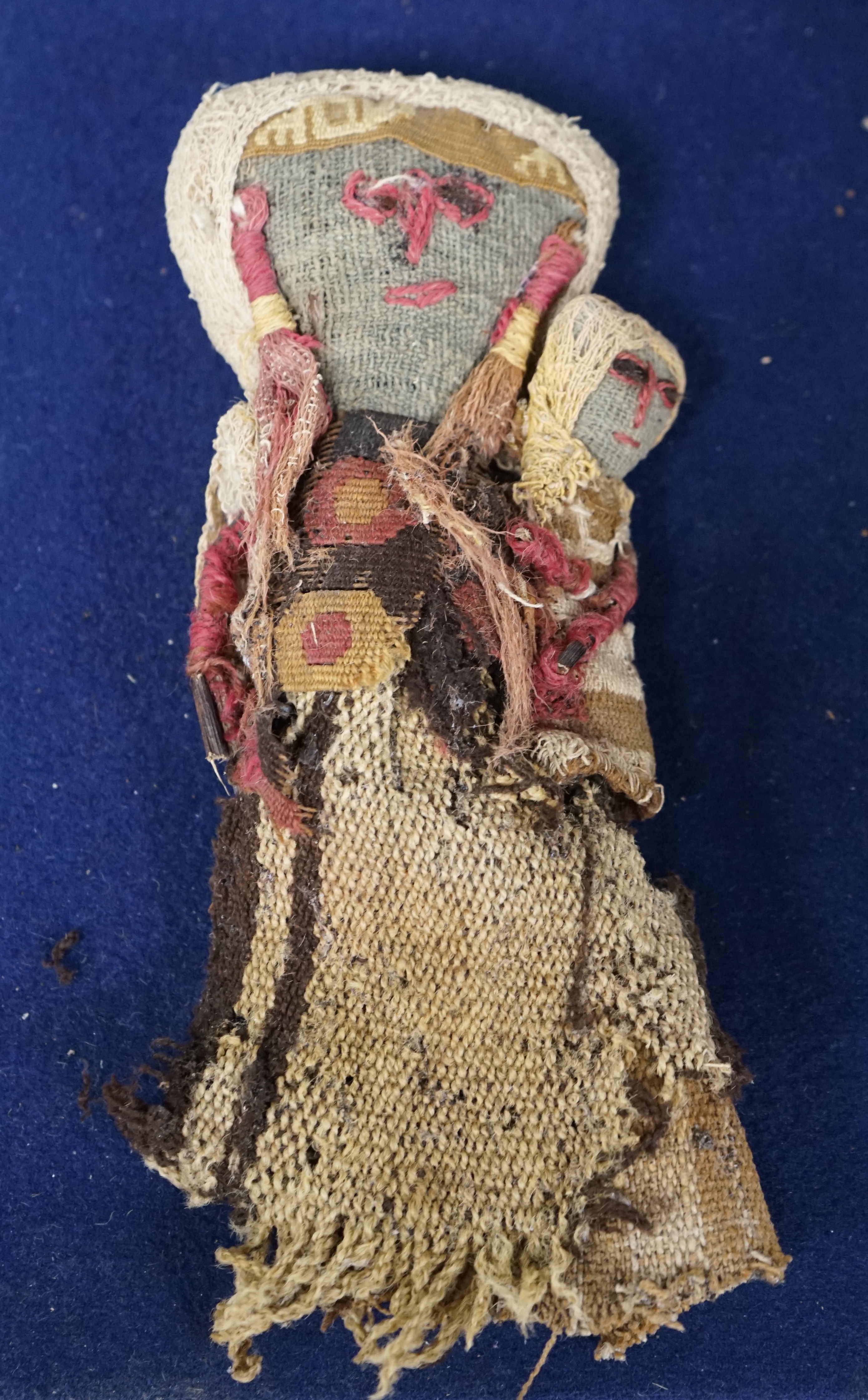 A pre Columbian textile doll, 20cm. Condition - worn as expected